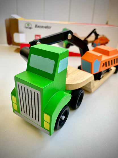 Camion de remolque con excavadora